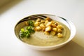 Bowl of homemade cream soup with croutons and gresh green parsley Royalty Free Stock Photo