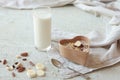 Bowl of homemade muesli with nuts, berries, dried fruits, glass of milk and honey. healthy breakfast Royalty Free Stock Photo