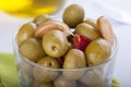 Bowl of homemade olives on a glass, typical spanish tapa