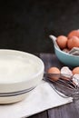 Bowl of Pancake Batter with Egg Whisk Royalty Free Stock Photo