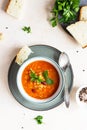 A bowl of homemade red bean and lentil soup, bread and parsley on stone background. Vegetable spicy soup. Selective focus. Top Royalty Free Stock Photo
