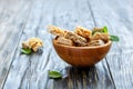 Bowl with honey bars with peanuts, sunflower and sesame seeds.