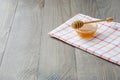 Bowl of honey with honey stick Royalty Free Stock Photo