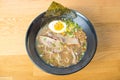 Bowl of Hot and Sour Beef Broth With Spinach Ramen Noodles Royalty Free Stock Photo