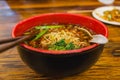 Bowl of hot and spicy chinese noodle soup, spicy ramen Royalty Free Stock Photo