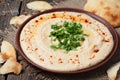 Bowl of hummus, traditional mediterranean smooth Royalty Free Stock Photo