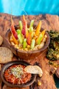 Bowl of humus with vegetables