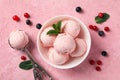 Bowl with ice cream and berries on background, top view Royalty Free Stock Photo