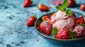 Bowl of ice cream and strawberries on blue table Royalty Free Stock Photo