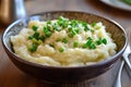 A bowl of Irish champ with scallions and buttery mash. Royalty Free Stock Photo