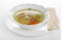 Bowl of Jewish matzoh balls soup on white Royalty Free Stock Photo