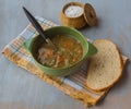 A bowl of lentil soup with a bread and salt Royalty Free Stock Photo