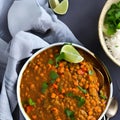 A bowl of lentil and vegetable curry with a side of rice2, Generative AI