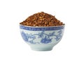Bowl of loose Rooibos red tea, isolated Royalty Free Stock Photo