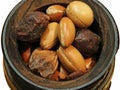 Bowl with argan seeds for the production of beauty cosmetics