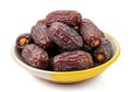 Bowl of medjool dates isolated on white background Royalty Free Stock Photo