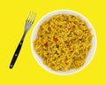 Bowl of Mexican rice on a yellow background Royalty Free Stock Photo