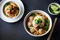 A bowl of mie bakso, a popular Indonesian meatball soup served with noodles. Top view. Generative AI Royalty Free Stock Photo