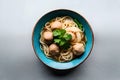 A bowl of mie bakso, a popular Indonesian meatball soup served with noodles. Top view. Generative AI Royalty Free Stock Photo