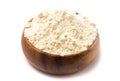 Bowl of Millet Flour in a Wood Bowl Isolated on a White Background