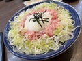 A bowl of minced tuna belly on sushi rice