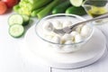 Bowl of Mini Mozzarella Fresh Tomatoes Cucumber Celery Olive Oil Italian Salad Healthy Food White Background Royalty Free Stock Photo