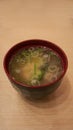 A bowl of miso soup, a Japanese classic. Crafted from dashi and miso paste, it is a harmonious blend of flavors. Enjoy with wakame
