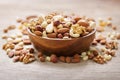 bowl of mixed nuts on wooden table Royalty Free Stock Photo