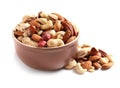 Bowl with mixed organic nuts on white background Royalty Free Stock Photo