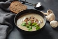 A bowl of Mushroom Cream Soup with fried champignons and fresh parsley Royalty Free Stock Photo