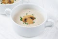 A bowl of mushroom cream soup on white boards Royalty Free Stock Photo