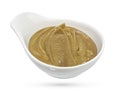 Bowl of mustard on white background. Royalty Free Stock Photo