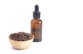Bowl of Myrrh with a Bottle of Essential Oil on a White Background Royalty Free Stock Photo