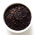 Bowl of Nerone black long grain rice on white from abov Royalty Free Stock Photo