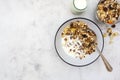 Bowl of oatmeal cereal. Whole oats, granola with dried fruit and blueberry, milk and honey. Healthy food breakfast. Copy space Royalty Free Stock Photo