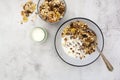 Bowl of oatmeal cereal. Whole oats, granola with dried fruit and blueberry, milk and honey. Healthy food breakfast. Copy space Royalty Free Stock Photo