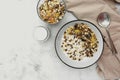 Bowl of oatmeal cereal. Whole oats, granola with dried fruit and blueberry, milk and honey. Healthy food breakfast. Copy space Royalty Free Stock Photo