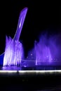 Bowl of the Olympic flame Firebird and singing Fountain in the Olympic park in the evening