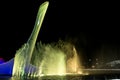 Bowl of the Olympic flame Firebird and singing Fountain in the Olympic park in the evening