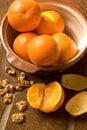Bowl of oranges on Spanish tile floor Royalty Free Stock Photo
