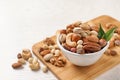 Bowl with organic mixed nuts on table Royalty Free Stock Photo
