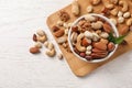 Bowl with organic mixed nuts on table Royalty Free Stock Photo