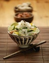Bowl of Oriental asparagus prawn and noodle stir fry