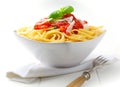 Bowl of pasta with tomato sauce and fresh basil Royalty Free Stock Photo