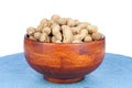 Bowl of peanuts on a white background Royalty Free Stock Photo