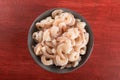 A bowl of peeled fresh raw white shrimp with tail Royalty Free Stock Photo