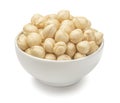 Bowl of peeled hazelnuts isolated on white background Royalty Free Stock Photo