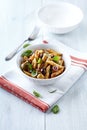 Penne with dried tomato pesto, olives and herbs