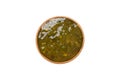 Bowl of pesto sauce isolated on white background. top view Royalty Free Stock Photo