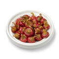 Bowl with pickled Red Cherry chili peppers close up on white background Royalty Free Stock Photo